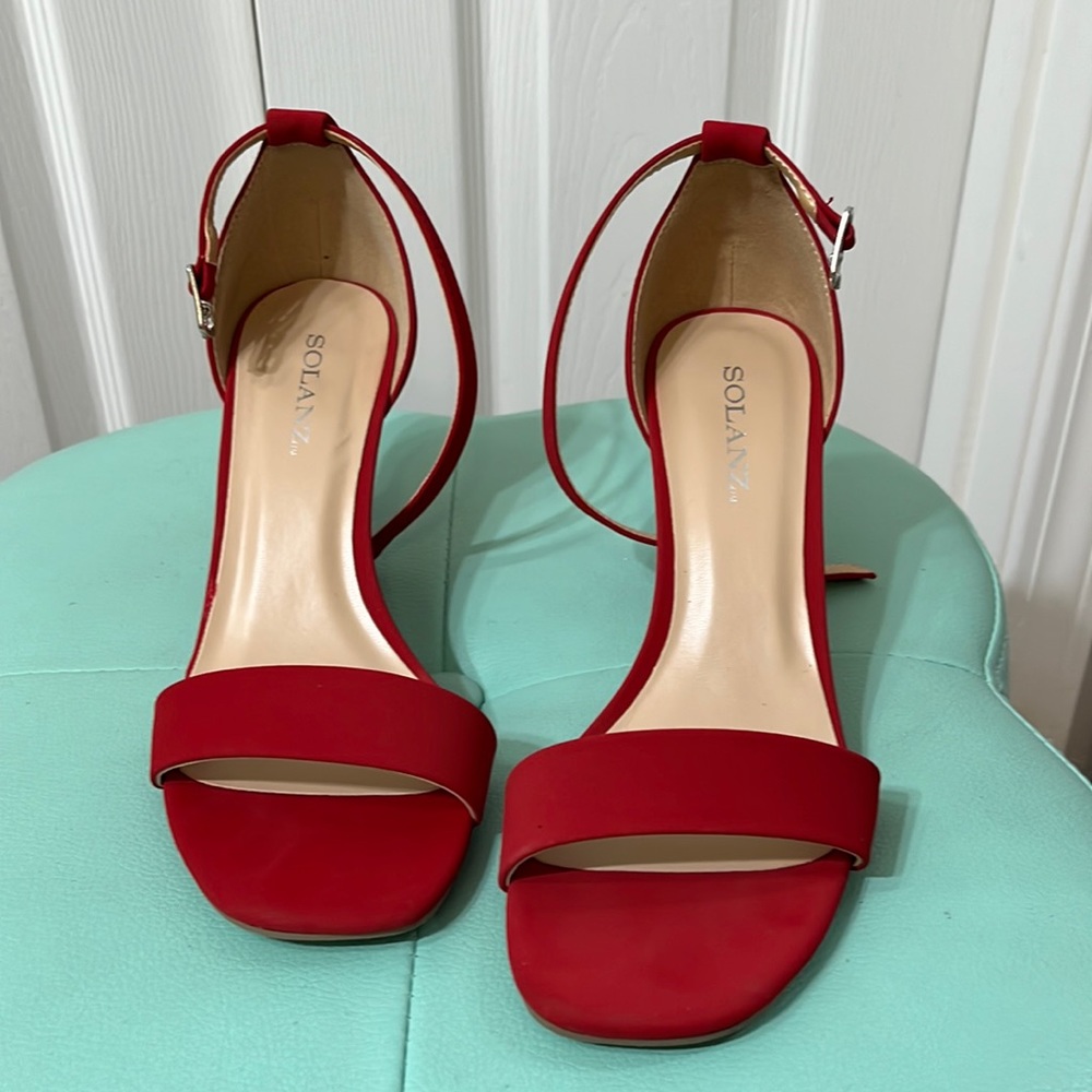 Red strappy heels